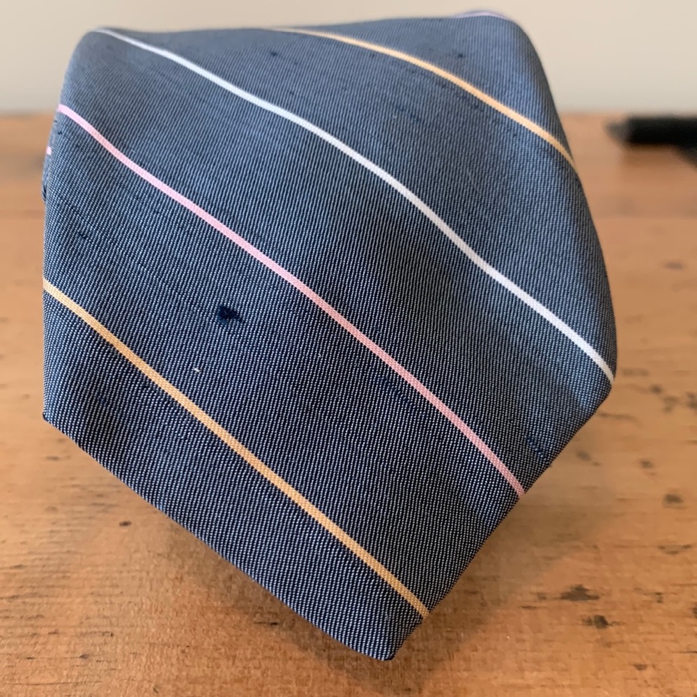 Ed Mitchell’s gray striped skinny tie